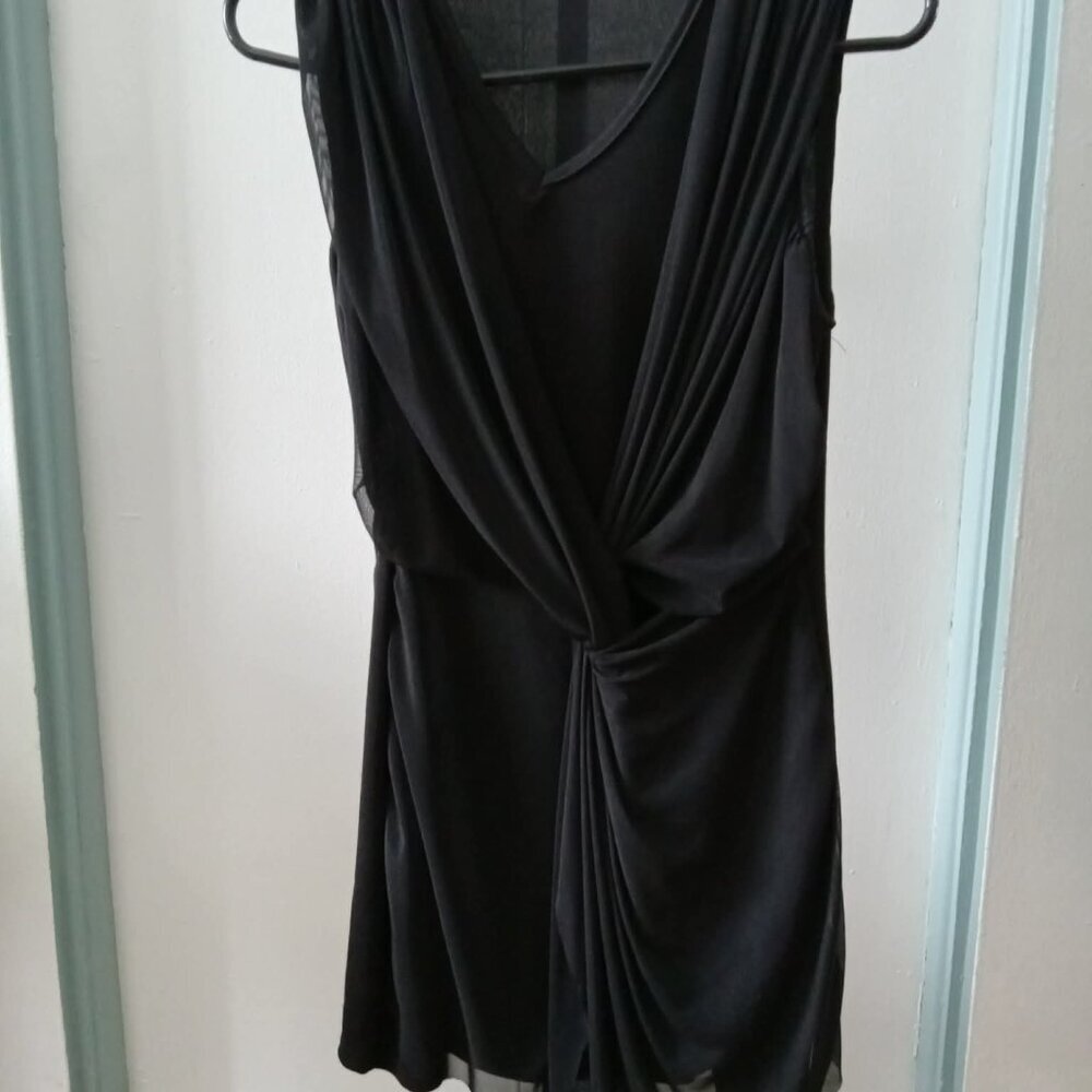 Beautiful black dress with crossover neckline and asymmetrical skirt